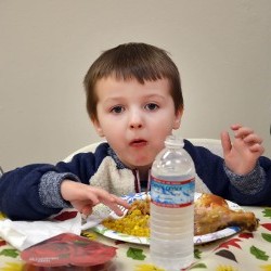 Child Eating a Meal