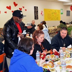 Group of People Eating a Meal