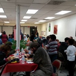 People Eating at in New Day Ministry